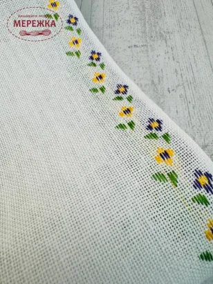 Фото Стрічка Vaupel and Heilenbeck льон 100%, біла, кант фіолетові квіти, 17.5 см.