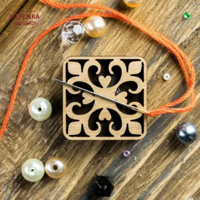 Магніт для паркування голки фото