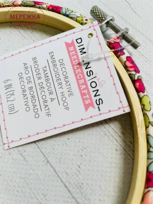 Фото п'яльця для вишивання Діменшинз, обтягнуті текстилем