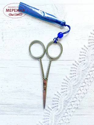 Фото ножиці срібло з китичкою