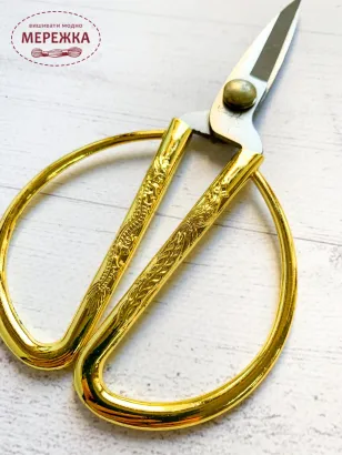 Фото ножиці золота фігурна ручка