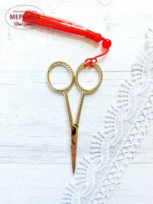 Фото ножиці золото з китичкою