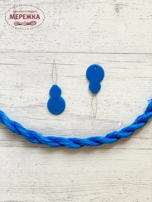 Фото нитковдівач пластиковий 