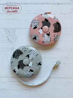 Фото сантиметрова стрічка від ДМС рожева